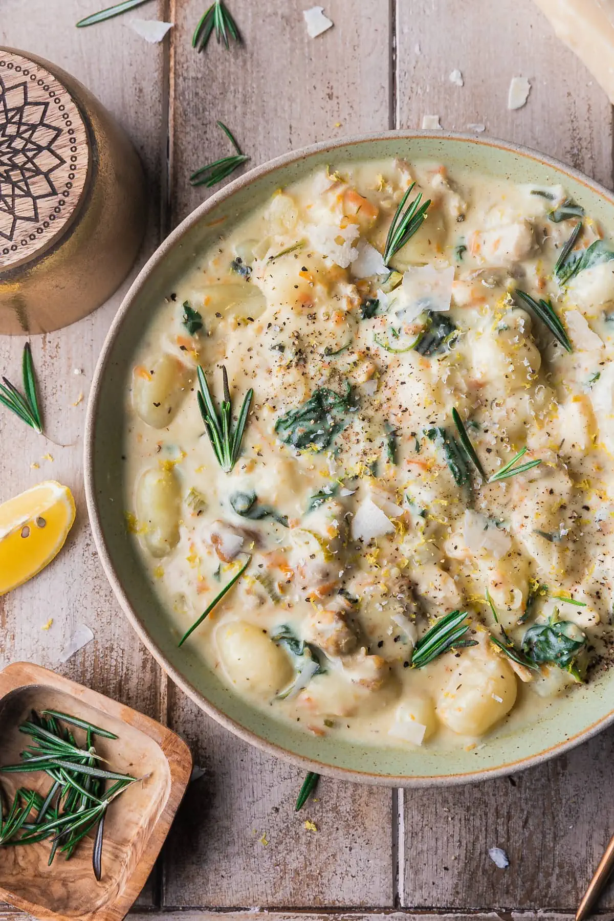 overhead view of a bowl of olive garden copycat chicken and gnocchi soup